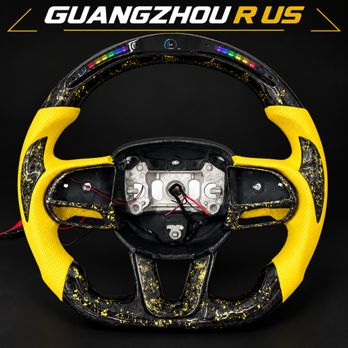 Yellow and black forged-carbon LED steering wheel — front